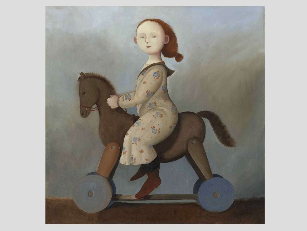 GIRL ON A TOY HORSE